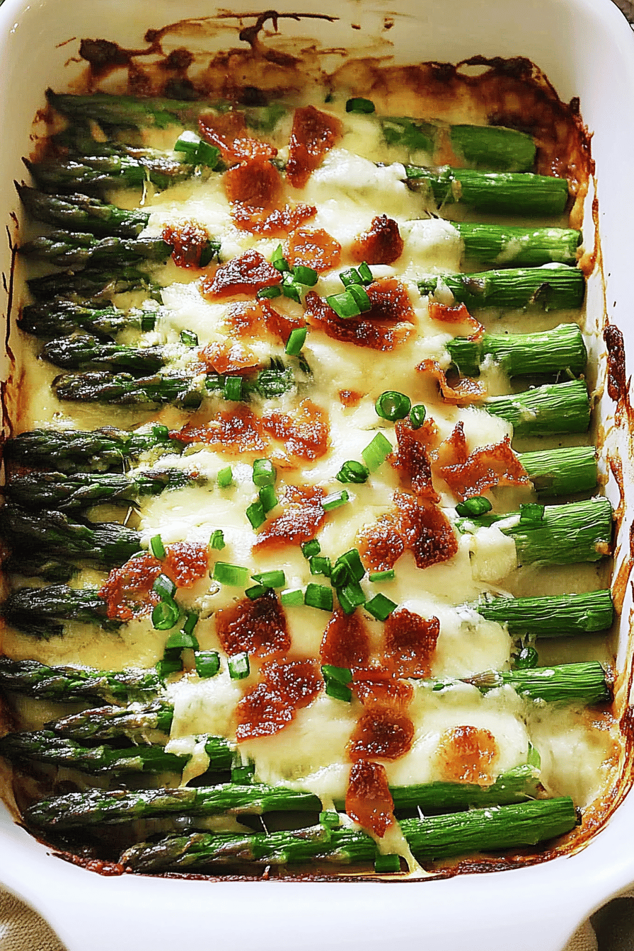 Cheesy Baked Asparagus slice on plate showing perfect texture and swirl pattern