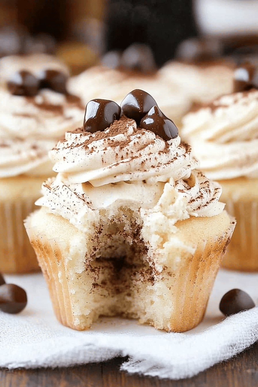 Tiramisu Cupcakes slice on plate showing perfect texture and swirl pattern